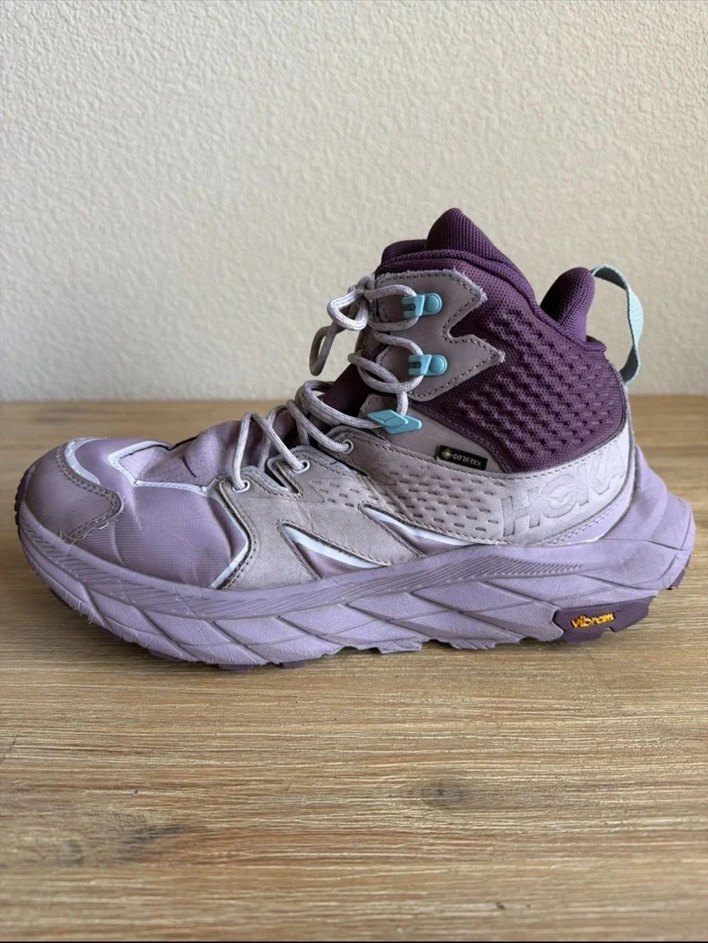 Hoka Lavender and Deep Purple High-Top Trail Sneakers